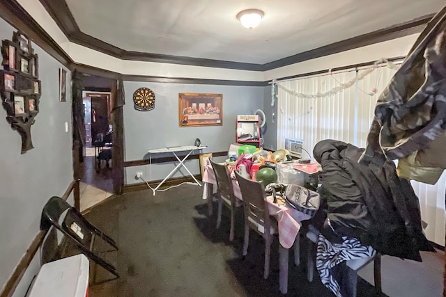10817 S Forest Ave, Chicago, IL 60628 - dining space featuring carpet flooring, baseboards, and crown molding