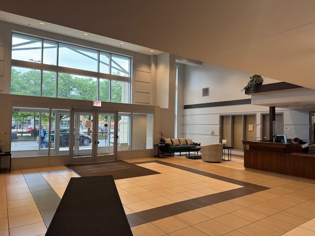 100 N Hermitage Ave Unit 409, Chicago, IL 60612 - lobby with a high ceiling and recessed lighting
