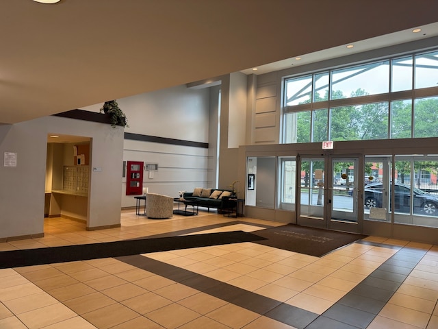 100 N Hermitage Ave Unit 409, Chicago, IL 60612 - building lobby with a high ceiling and recessed lighting