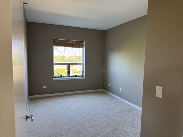 100 N Hermitage Ave Unit 409, Chicago, IL 60612 - carpeted empty room featuring baseboards