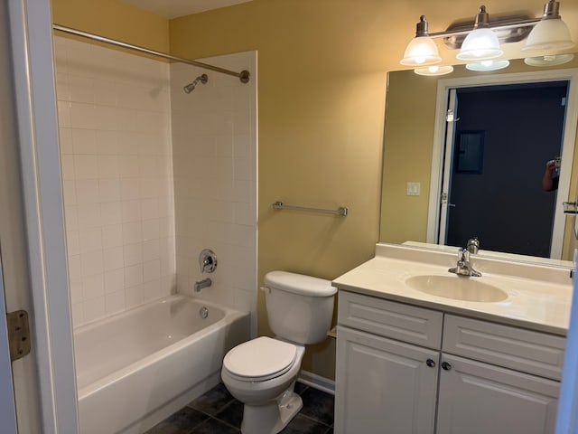 100 N Hermitage Ave Unit 409, Chicago, IL 60612 - bathroom featuring tile patterned floors, toilet, vanity, shower / bathtub combination, and baseboards