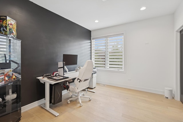 218 E 46th St, Chicago, IL 60653 - home office featuring wood finished floors, baseboards, and recessed lighting
