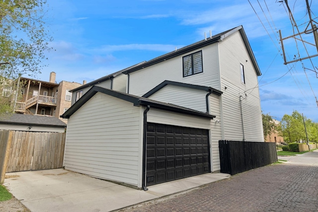 218 E 46th St, Chicago, IL 60653 - view of property exterior with a garage
