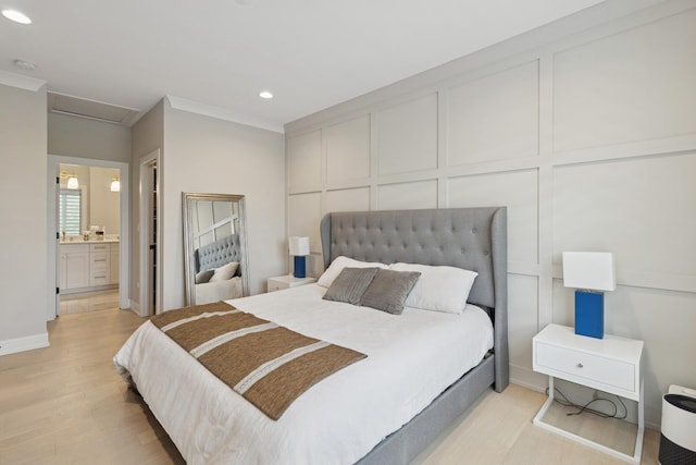 218 E 46th St, Chicago, IL 60653 - bedroom featuring a decorative wall, attic access, recessed lighting, crown molding, and light wood-style floors