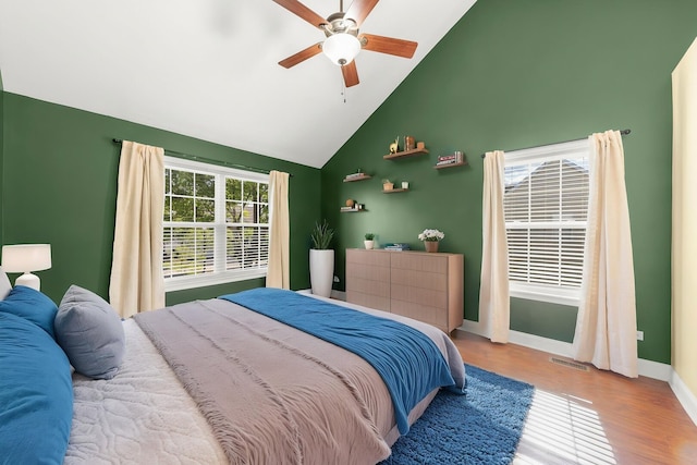 24608 George Washington Dr, Plainfield, IL 60544 - bedroom featuring high vaulted ceiling, wood finished floors, baseboards, and a ceiling fan