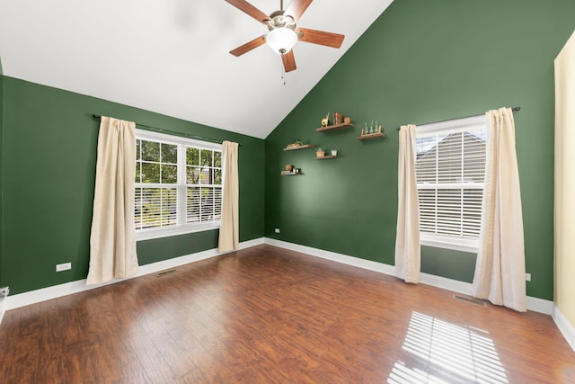 24608 George Washington Dr, Plainfield, IL 60544 - spare room featuring ceiling fan, high vaulted ceiling, wood finished floors, and baseboards