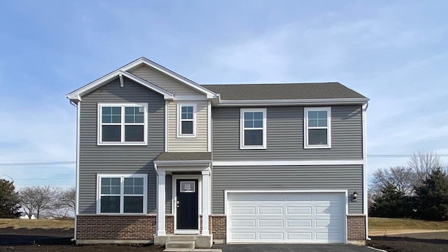 4203 High Point Ct, Joliet, IL 60436 - view of front of home with brick siding, a garage, and driveway