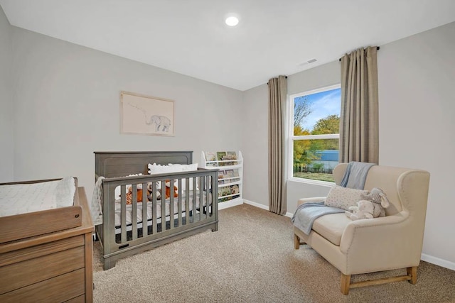 4203 High Point Ct, Joliet, IL 60436 - bedroom featuring baseboards, carpet, and a crib