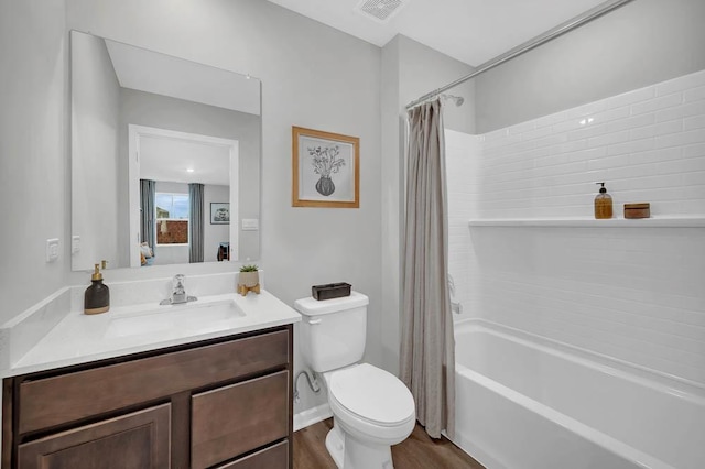 4203 High Point Ct, Joliet, IL 60436 - bathroom featuring wood finished floors, toilet, vanity, and shower / bathtub combination with curtain