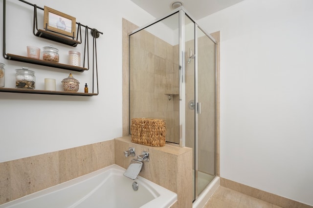 550 W Fulton St Unit 303, Chicago, IL 60661 - full bath featuring a shower stall, a bath, and tile patterned floors