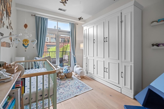 550 W Fulton St Unit 303, Chicago, IL 60661 - bedroom featuring light wood-style floors