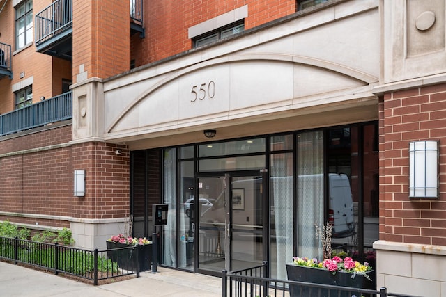 550 W Fulton St Unit 303, Chicago, IL 60661 - entrance to property with brick siding