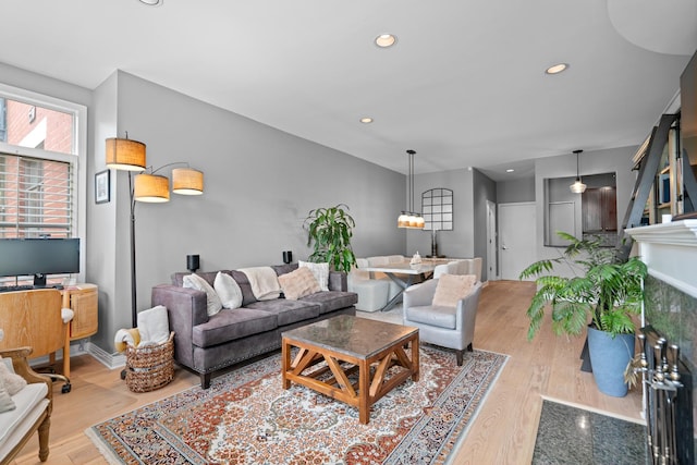 550 W Fulton St Unit 303, Chicago, IL 60661 - living room featuring wood finished floors and recessed lighting