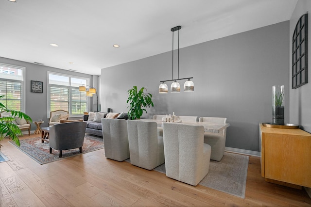 550 W Fulton St Unit 303, Chicago, IL 60661 - dining space featuring hardwood / wood-style floors, recessed lighting, and baseboards