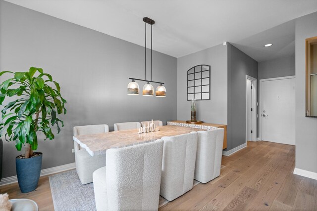 550 W Fulton St Unit 303, Chicago, IL 60661 - dining space featuring baseboards, light wood-style flooring, and recessed lighting