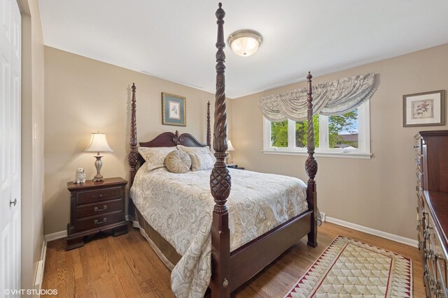 4N671 Petersdorf Rd, West Chicago, IL 60185 - bedroom with wood finished floors and baseboards