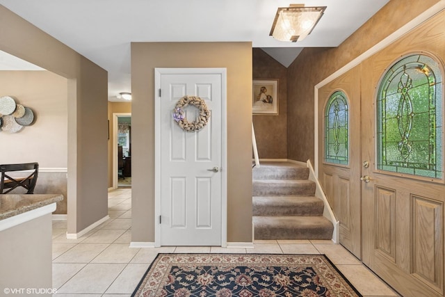 4N671 Petersdorf Rd, West Chicago, IL 60185 - foyer featuring light tile patterned floors, baseboards, and stairway