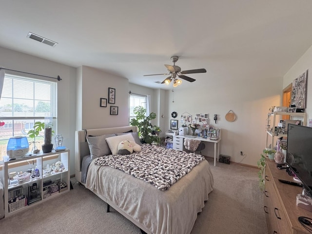 3854 Trading Post Ln, Joliet, IL 60435 - bedroom featuring light carpet, ceiling fan, and baseboards