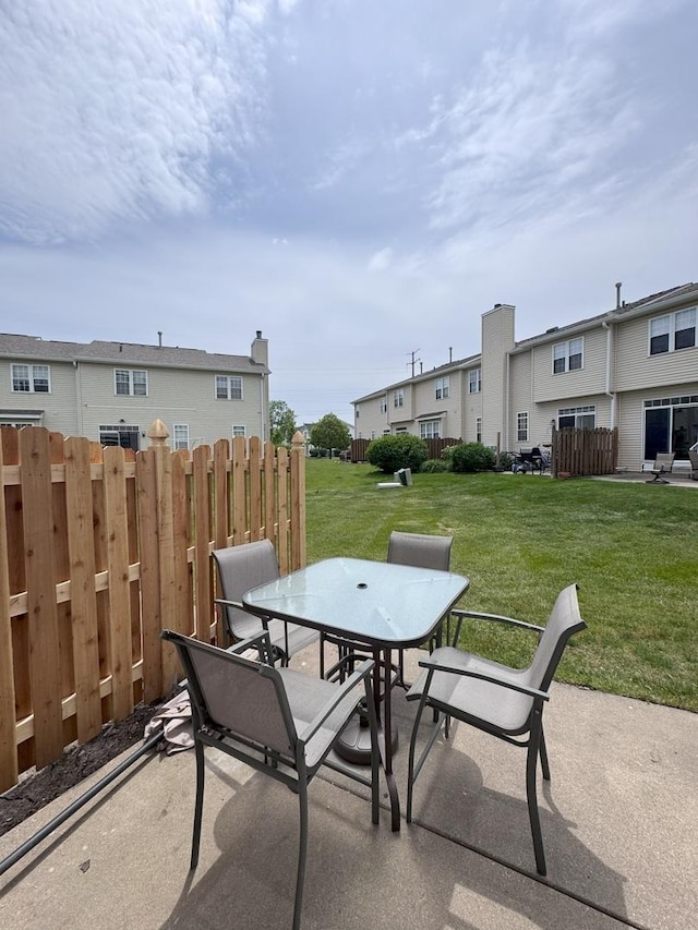 3854 Trading Post Ln, Joliet, IL 60435 - view of patio featuring outdoor dining area and a residential view