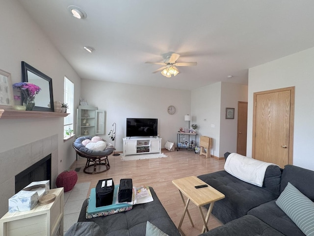3854 Trading Post Ln, Joliet, IL 60435 - living room with ceiling fan, a tile fireplace, and wood finished floors