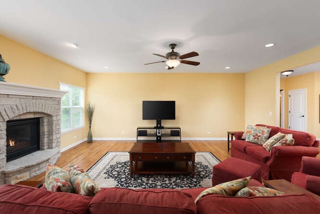 677 Slate Run, Elgin, IL 60124 - living room with ceiling fan, a fireplace, wood finished floors, baseboards, and recessed lighting