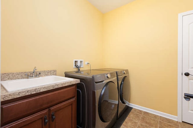 677 Slate Run, Elgin, IL 60124 - washroom featuring separate washer and dryer, cabinet space, and baseboards