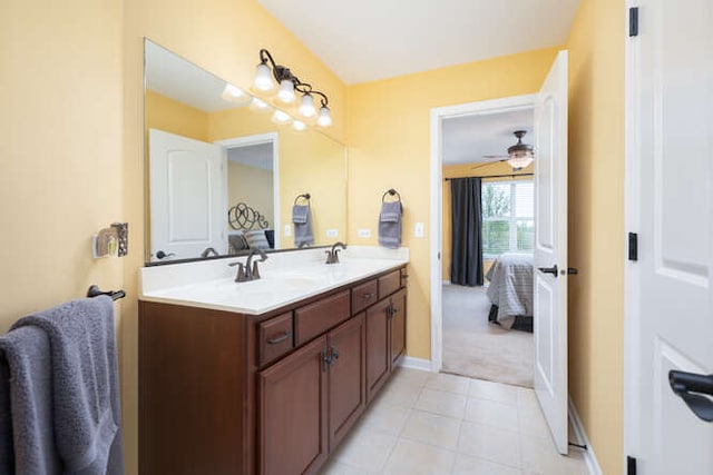 677 Slate Run, Elgin, IL 60124 - ensuite bathroom featuring double vanity, tile patterned floors, baseboards, and ceiling fan