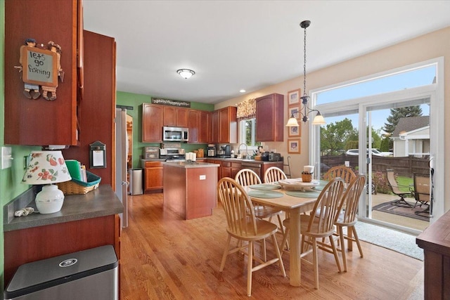 605 Acorn Ct, Antioch, IL 60002 - dining area with plenty of natural light and light wood-type flooring