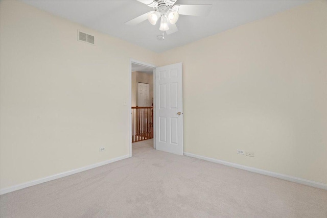 605 Acorn Ct, Antioch, IL 60002 - unfurnished room with baseboards, light carpet, and ceiling fan