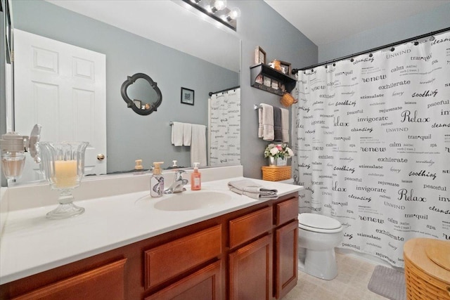 605 Acorn Ct, Antioch, IL 60002 - bathroom with toilet, vanity, and a shower with shower curtain