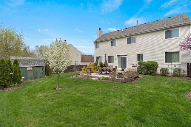 605 Acorn Ct, Antioch, IL 60002 - back of house featuring a patio and a chimney