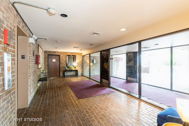 5 E Carriageway Dr Unit 209, Hazel Crest, IL 60429 - lobby with brick wall