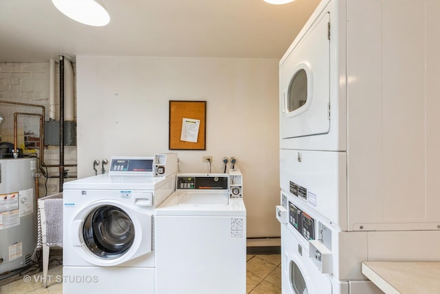 5 E Carriageway Dr Unit 209, Hazel Crest, IL 60429 - community laundry room with stacked washer / drying machine, washer and dryer, water heater, and light tile patterned floors