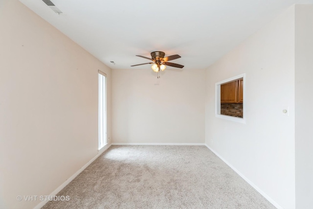 5 E Carriageway Dr Unit 209, Hazel Crest, IL 60429 - empty room featuring ceiling fan, light carpet, and baseboards