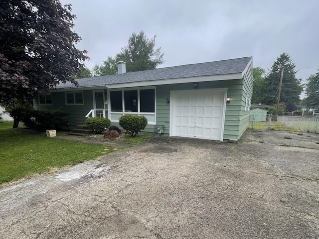 807 Finch Trl, Mchenry, IL 60051 - ranch-style home with an attached garage, a chimney, driveway, and roof with shingles