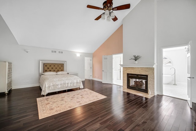 24161 Brancaster Dr, Naperville, IL 60564 - bedroom featuring high vaulted ceiling, baseboards, wood finished floors, a tiled fireplace, and ensuite bath