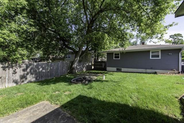 10100 W Chaplin Ave, Beach Park, IL 60087 - view of yard with an outdoor fire pit