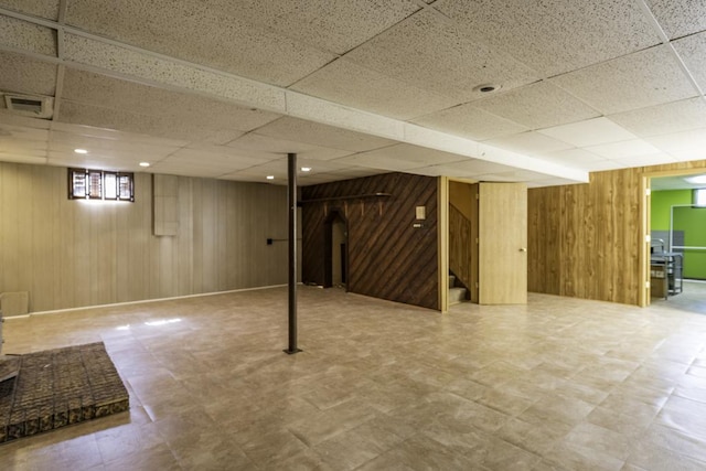 10100 W Chaplin Ave, Beach Park, IL 60087 - below grade area featuring wooden walls, stairs, and a drop ceiling