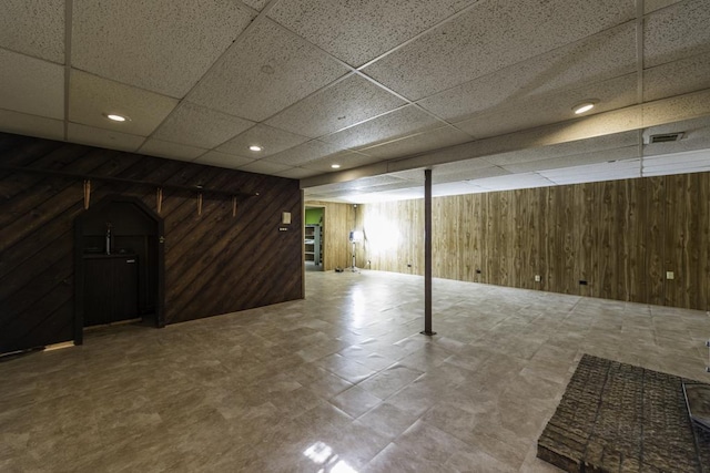 10100 W Chaplin Ave, Beach Park, IL 60087 - finished below grade area featuring wooden walls, a paneled ceiling, and recessed lighting