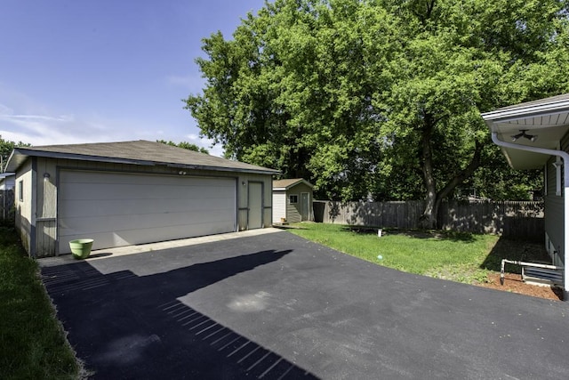 10100 W Chaplin Ave, Beach Park, IL 60087 - detached garage featuring a storage unit