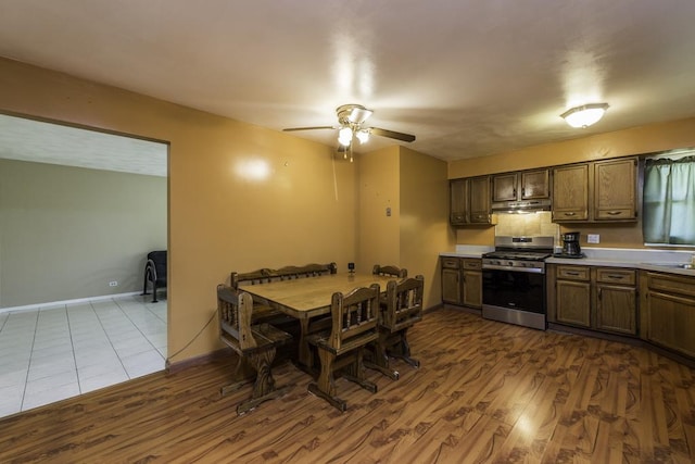 10100 W Chaplin Ave, Beach Park, IL 60087 - dining area featuring ceiling fan and dark wood-style flooring
