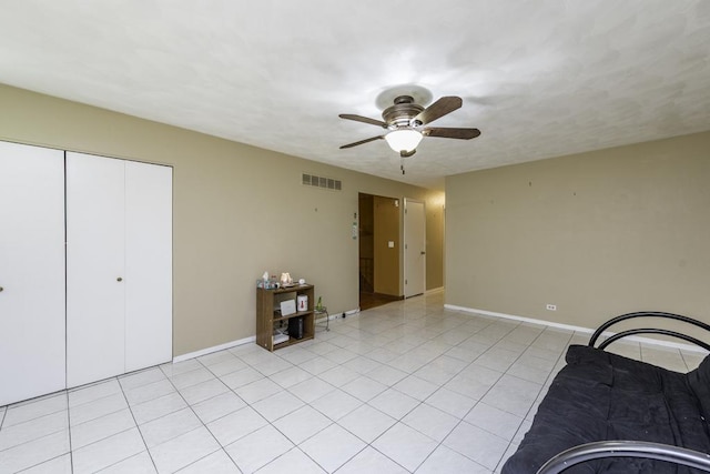 10100 W Chaplin Ave, Beach Park, IL 60087 - unfurnished room featuring a ceiling fan and light tile patterned flooring