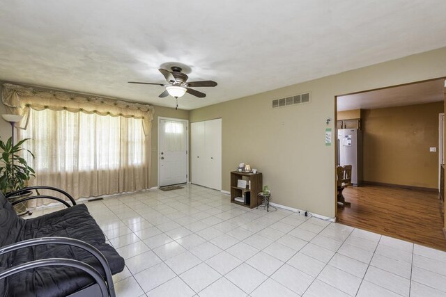 10100 W Chaplin Ave, Beach Park, IL 60087 - entryway featuring ceiling fan and light tile patterned flooring