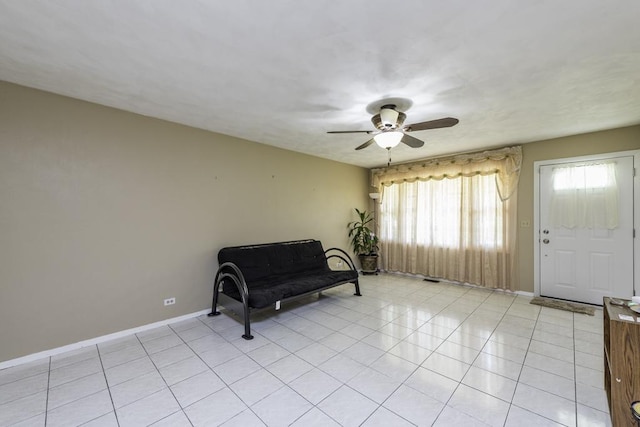 10100 W Chaplin Ave, Beach Park, IL 60087 - living area featuring ceiling fan and light tile patterned floors