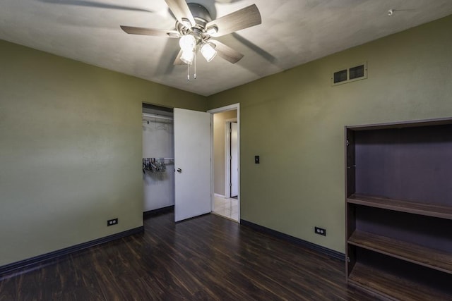 10100 W Chaplin Ave, Beach Park, IL 60087 - unfurnished bedroom with wood finished floors, a ceiling fan, and a closet