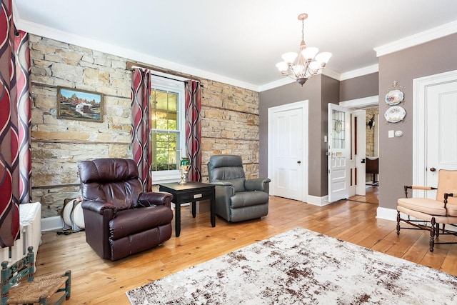 1006 S Jefferson St, Lockport, IL 60441 - sitting room featuring ornamental molding, a chandelier, hardwood / wood-style floors, and baseboards