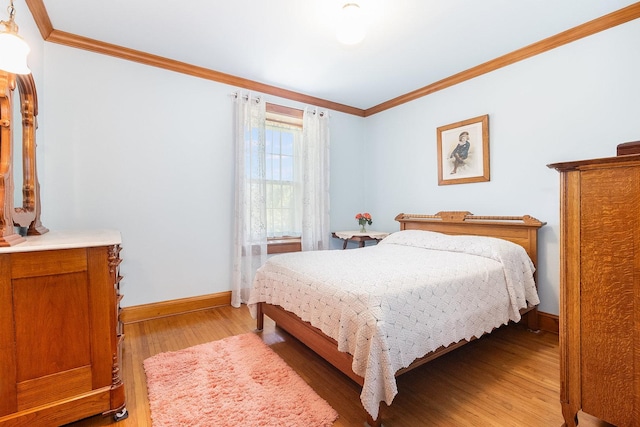 1006 S Jefferson St, Lockport, IL 60441 - bedroom featuring baseboards, crown molding, and light wood finished floors