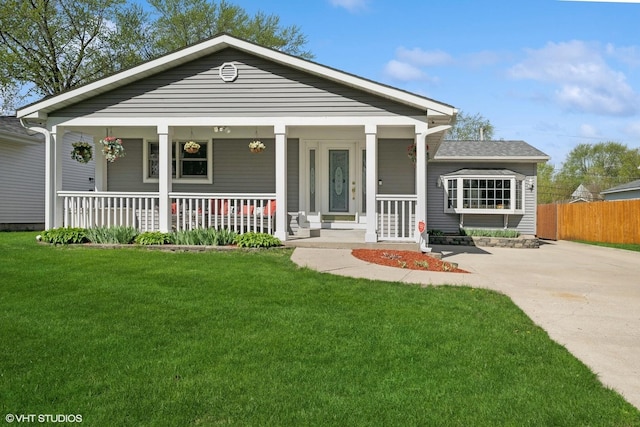 1713 Meadow Ln, Mchenry, IL 60050 - view of front facade featuring covered porch and concrete driveway