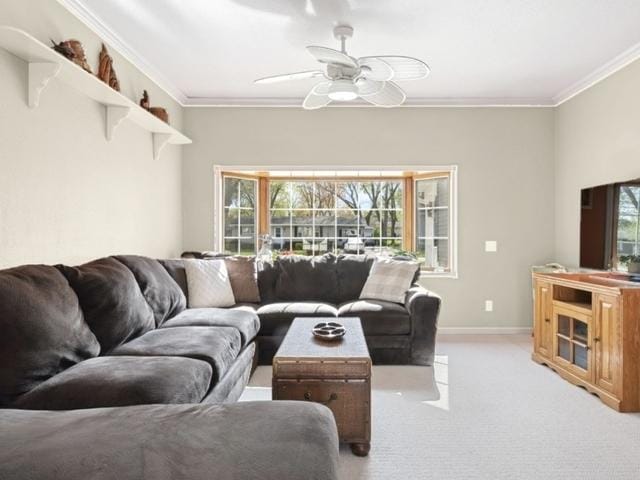 1713 Meadow Ln, Mchenry, IL 60050 - living area featuring light colored carpet, ceiling fan, plenty of natural light, crown molding, and baseboards
