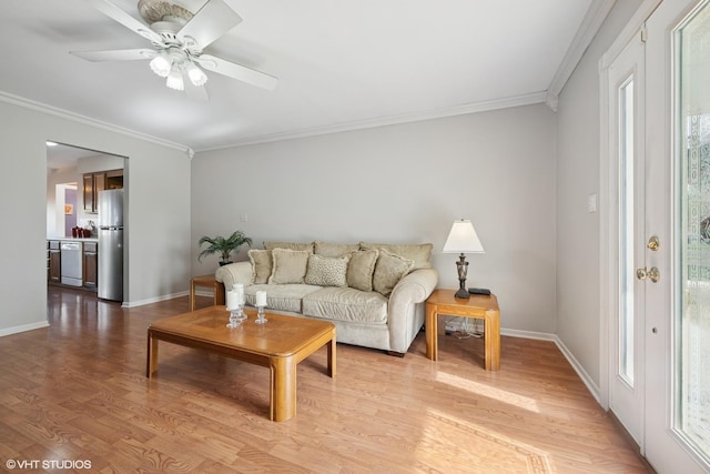 1713 Meadow Ln, Mchenry, IL 60050 - living area with crown molding, wood finished floors, baseboards, and a ceiling fan